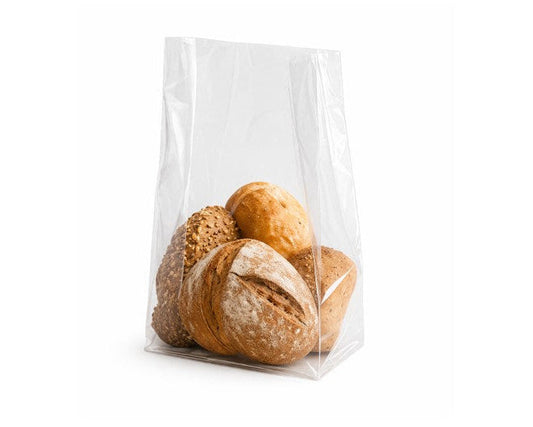 Clear plastic bag with bread loaves on a white background